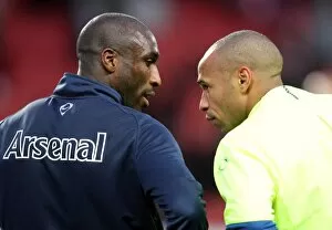 Sol Campbell (Arsenal) chats with Thierry Henry (Barcelona and Ex Arsenal) before the match