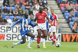 Images Dated 18th April 2010: Sol Campbell (Arsenal) Mohamed Diame (Wigan). Wigan Athletic 3: 2 Arsenal