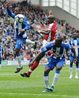 Wigan Athletic v Arsenal 2009-10 Gallery: Sol Campbell (Arsenal) Titus Bramble (Wigan). Wigan Athletic 3: 2 Arsenal