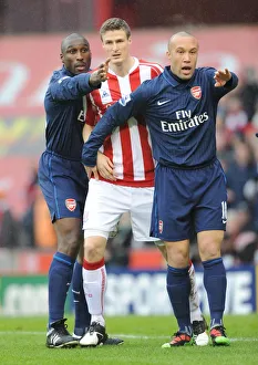 Sol Campbell and Mikael Silvestre (Arsenal) Robert Huth (Stoke). Stoke City 3:1 Arsenal Sol Campbell and Mikael Silvestre (Arsenal) Robert Huth (Stoke). Stoke City 3:1 Arsenal