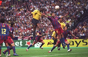 Campbell Sol Collection: Sol Campbell scores Arsenals goal under pressure from Oleguer (Barcelona)