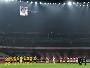 Arsenal V Wolverhampton Wanderers 2020-21 Prints: Solemn Tribute: Arsenal vs. Wolverhampton Wanderers - A Empty Emirates Stadium Honors Diego Maradona