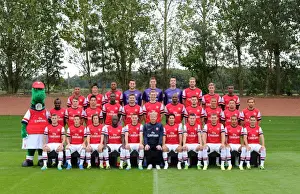 ST ALBANS, ENGLAND - SEPTEMBER 20: Arsenal Squad 2013 / 14 with Gunnersaurus at London