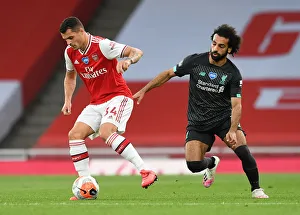 Arsenal V Liverpool 2019-20 Prints: Empty Stadium Showdown: Xhaka vs. Salah - Arsenal vs. Liverpool, Premier League 2019-2020