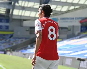 Brighton And Hove Albion V Arsenal 2019-20 Prints: Empty Stands: Dani Ceballos of Arsenal in Action against Brighton & Hove Albion