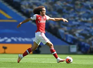Brighton And Hove Albion V Arsenal 2019-20 Prints: Empty Stands: Matteo Guendouzi of Arsenal in Action against Brighton & Hove Albion (2020)