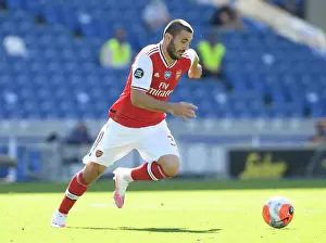 Brighton And Hove Albion V Arsenal 2019-20 Prints: Empty Stands: Sead Kolasinac of Arsenal in Action against Brighton & Hove Albion (2019-2020)