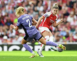 Arsenal Women V Liverpool Women 2023-24 Prints: Steph Catley Faces Intense Pressure: Arsenal Women vs Liverpool Women's Super League Showdown at Emirates Stadium