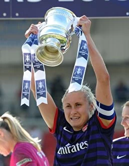 Arsenal Ladies v Bristol Academy - FA Cup Final 2013 Collection: Steph Houghton Lifts FA Women's Cup for Arsenal: Arsenal Ladies vs. Bristol Academy (2013)