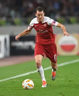 Qarabag V Arsenal 2018-19 Prints: Stephan Lichtsteiner Clashes with Micel: Qarabag vs Arsenal, UEFA Europa League 2018-19
