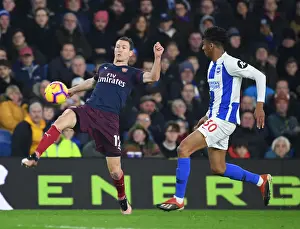 Brighton And Hove Albion V Arsenal 2018-19 Prints: Stephan Lichtsteiner vs Bernardo: A Premier League Battle at the American Express Community Stadium