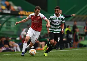 Sporting Lisbon V Arsenal 2018-19 Prints: Stephan Lichtsteiner vs Bruno Fernandes: Clash of the Europa League Titans