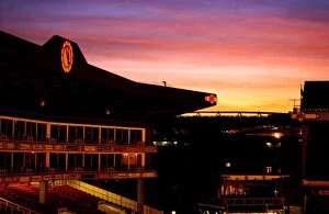 Emirates Stadium Collection: The Sun sets over The Arsenal and Emirates stadiums