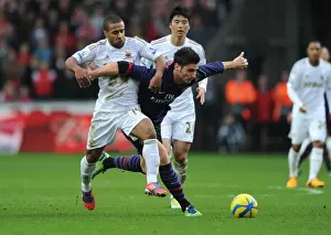 Swansea V Arsenal - FA Cup 3rd Rd 2012-13 Prints: Swansea vs Arsenal: Olivier Giroud vs Wayne Routledge Clash in FA Cup Third Round
