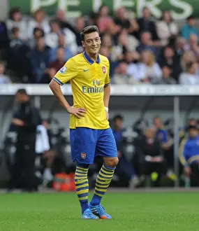 Swansea Prints: SWANSEA, WALES - SEPTEMBER 28: Mesut Ozil of Arsenal during the Swansea v Arsenal Premier Leageu match at Liberty