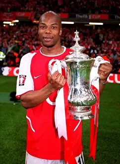 Arsenal V Southampton FA Cup Final Prints: Sylvain Wiltord Lifts the FA Cup: Arsenal's Victory over Southampton (1-0)