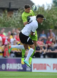 Boreham Wood V Arsenal Prints: Szczesny vs. Angol: A Fierce Encounter in Arsenal's Pre-Season Clash