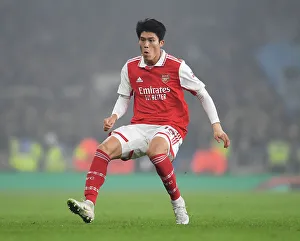 Arsenal V FC Zurich 2022-23 Prints: Takehiro Tomiyasu in Action: Arsenal vs. FC Zurich - UEFA Europa League 2022-23