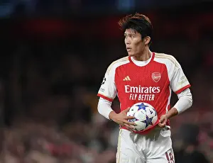 Takehiro Tomiyasu in Action: Arsenal vs Sevilla - UEFA Champions League 2023/24