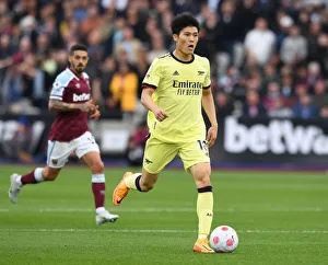 Takehiro Tomiyasu in Action: West Ham United vs. Arsenal, Premier League 2021-22