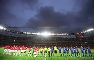 The teams line up before the match