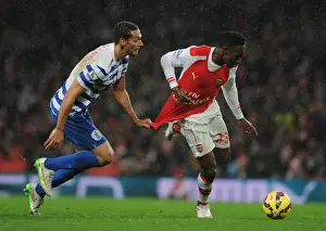 Arsenal V Queens Park Rangers 2014-15 Prints: Tense Rivalry: Welbeck vs. Ferdinand Clash at Arsenal vs. QPR