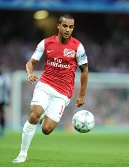 Arsenal v Udinese 2011-12 Collection: Theo Walcott in Action: Arsenal vs Udinese, UEFA Champions League Play-Off 2011