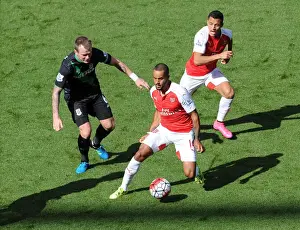 Theo Walcott and Alexis Sanchez (Arsenal) Glen Whelan (Stoke). Arsenal 2: 0 Stoke City