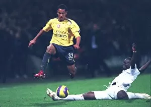 Bolton Wanderers v Arsenal 2006-07 Collection: Theo Walcott (Arsenal) Abdoulaye Faye (Bolton)