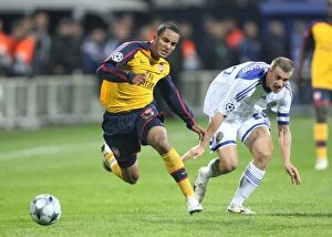 Images Dated 17th September 2008: Theo Walcott (Arsenal) Andriy Nesmachniy (Dynamo Kiev)