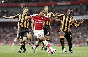 Arsenal v Hull City 2008-9 Collection: Theo Walcott (Arsenal) Andy Dawson (left) and Kamil Zayatte (Hull)