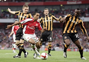 Arsenal v Hull City 2008-9 Collection: Theo Walcott (Arsenal) Andy Dawson (left) and Kamil Zayatte (Hull)
