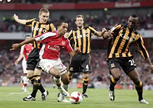 Arsenal V Hull City 2008-9 Prints: Theo Walcott (Arsenal) Andy Dawson (left) and Kamil Zayatte (Hull)