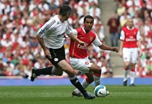 Images Dated 22nd September 2007: Theo Walcott (Arsenal) Andy Griffin (Derby)
