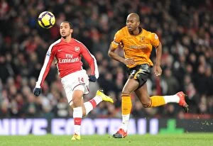 Images Dated 19th December 2009: Theo Walcott (Arsenal) Anthony Gardner (Hull). Arsenal 3: 0 Hull City, Barclays Premier league