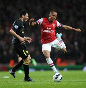 Theo Walcott (Arsenal) Antolin Alcaraz (Wigan). Arsenal 4:1 Wigan Athletic. Barclays Premier League. Emirates Stadium, 14/5/13. Credit : Arsenal Football Club / David Price Images Dated 14th May 2013: Theo Walcott (Arsenal) Antolin Alcaraz (Wigan). Arsenal 4: 1 Wigan Athletic. Barclays Premier League