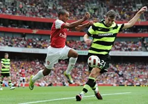 Arsenal v Celtic 2010-11 Collection: Theo Walcott (Arsenal) Charlie Mulgrew (Celtic). Arsenal 3: 2 Celtic. Emirates Cup