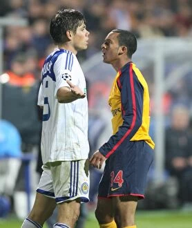 Images Dated 17th September 2008: Theo Walcott (Arsenal) confronts Ognjen Vukojevic (Dynamo Kiev)
