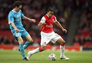 Images Dated 7th March 2007: Theo Walcott (Arsenal) Csaba Feher (PSV)