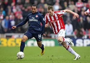 Stoke City v Arsenal - FA Cup 2009-10 Gallery: Theo Walcott (Arsenal) Danny Collins (Stoke). Stoke City 3: 1 Arsenal. FA Cup 4th Round