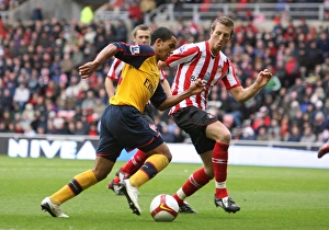 Sunderland v Arsenal 2008-9 Gallery: Theo Walcott (Arsenal) Danny Collins (Sunderland)