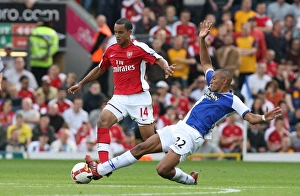 Blackburn Rovers v Arsenal 2008-9 Collection: Theo Walcott (Arsenal) Danny Simpson (Blackburn)