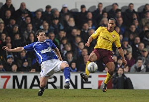 Ipswich Town v Arsenal Carling Cup 2010-11 Collection: Theo Walcott (Arsenal) Darren O Dea (Ipswich). Ipswich Town 1: 0 Arsenal