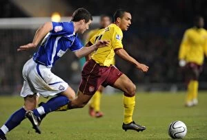 Ipswich Town v Arsenal Carling Cup 2010-11 Collection: Theo Walcott (Arsenal) Darren O Dea (Ipswich). Ipswich Town 1: 0 Arsenal