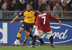 Images Dated 11th March 2009: Theo Walcott (Arsenal) David Pizarro (Roma)