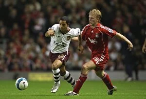 Liverpool v Arsenal 2007-8 Collection: Theo Walcott (Arsenal) Dirk Kuyt (Liverpool)