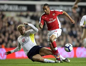 Tottenham Hotspur V Arsenal 2009-10 Prints: Theo Walcott (Arsenal) Eidur Gudjohnsen (Tottenham). Tottenham Hotspur 2: 1 Arsenal