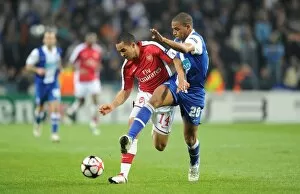 Images Dated 17th February 2010: Theo Walcott (Arsenal) Fernando (Porto). FC Porto 2: 1 Arsenal, UEFA Champions League
