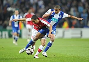 Images Dated 17th February 2010: Theo Walcott (Arsenal) Fernando (Porto). FC Porto 2: 1 Arsenal, UEFA Champions League