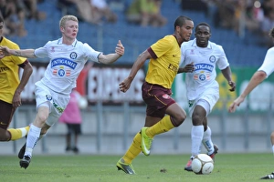 Images Dated 21st July 2010: Theo Walcott (Arsenal) Florian Kainz (Sturm Graz). Sturm Graz 0: 4 Arsenal